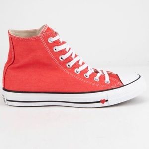 Red denim hi top converse.